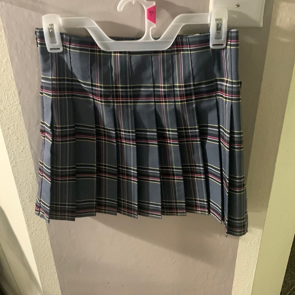 Cute gray pink yellow plaid skirt. Brand new. Never worn